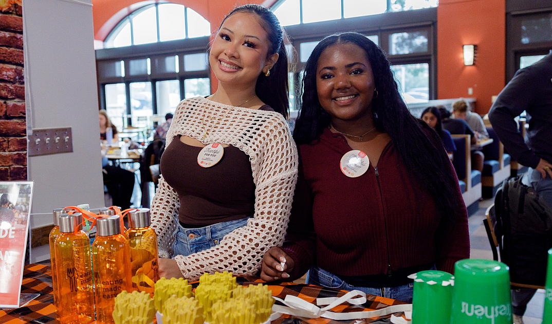 two students at All For You events